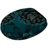 A close-up view of a toilet seat cover with a floral pattern. Produktbild-Vorschau