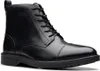 A black leather boot on a white background. Produktbild-Vorschau