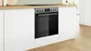 A built-in oven and stovetop set integrated into a modern kitchen counter. Produktbild-Vorschau