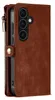 A close-up view of a brown leather wallet case for a smartphone, showing the camera cutout and a zipper. Produktbild-Vorschau