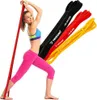 A woman is posing with resistance bands. Produktbild-Vorschau