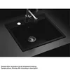 A black sink with a faucet and drain. Produktbild-Vorschau