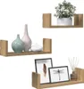 Three wooden U-shaped shelves are displayed against a white background, each holding decorative items. Podgląd zdjęcia produktu