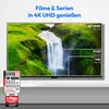 A television screen displaying a waterfall scene with resolution comparisons, accompanied by award badges. Produktbild-Vorschau