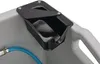 A close-up view of a black plastic attachment on the edge of a gray container, with a blue hose connected to a metal fitting on the left. Voir les images du produit