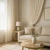 A cozy living room scene with a sofa, coffee table, and curtains. Produktbild-Vorschau