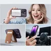 Collage of images showing an iPhone 14 Pro with accessories, including a case with a stand and wallet, and a car mount charger. Anteprima dell’immagine prodotto