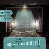 A ceiling fan above a bed with a person sleeping underneath. The image highlights product features like noise level, timer, and decibel comparisons. Produktbild-Vorschau