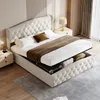A tufted upholstered bed with storage drawers underneath, made up with white bedding and a brown throw blanket. Náhľad obrázku produktu