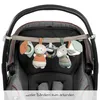 A baby stroller accessory with hanging toys. Produktbild-Vorschau