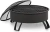 A black metal fire pit with a grill grate and a detached mesh spark screen, shown on a white background. Produktbild-Vorschau