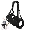 A person is holding a black dog support harness with a dog wearing it. Produktbild-Vorschau