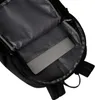 The inside of a black backpack with a laptop inside. Produktbild-Vorschau
