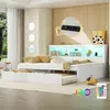 A white daybed with a pull-out trundle bed, featuring LED lighting and a built-in charging station. Náhled obrázku produktu