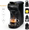 A black HiBREW coffee machine is shown with coffee brewing into a glass mug. Various plug types and coffee pods are displayed on the left and right sides. Produktbild-Vorschau
