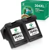 Two black ink cartridges are shown in the foreground, with a green box of ink cartridges in the background. Produktbild-Vorschau
