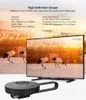A TV screen displaying a nature scene, with a small black device in the foreground. Produktbild-Vorschau