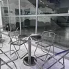 A cafe or restaurant setting with tables and chairs. Produktbild-Vorschau