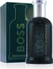 A bottle of Hugo Boss Bottled Triumph Elixir EDP and its packaging are displayed against a white background. Náhled obrázku produktu