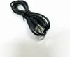 A black USB cable coiled on a white surface. Produktbild-Vorschau