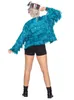 A person wearing a turquoise fringed jacket and black shorts, viewed from the back. Produktbild-Vorschau