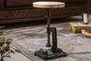 An adjustable height side table with a wooden top and cast iron base, placed on a rug in a living room setting. Produktbild-Vorschau