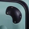 A close-up view of a teal suitcase with a black corner protector and rivets. Náhľad obrázku produktu