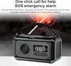 A black and gray emergency radio with an antenna extended, set against a dark, abstract background with red glowing elements. Podgląd zdjęcia produktu