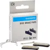A product package containing bicycle disc brake pads and related accessories, shown against a white background. Náhled obrázku produktu
