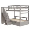 A gray bunk bed with stairs and a drawer underneath. Náhled obrázku produktu