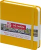 A yellow sketchbook with a descriptive band around it. Voir les images du produit