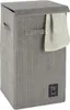 A grey laundry basket with a towel hanging from it. Podgląd zdjęcia produktu