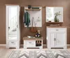 A hallway furniture set including a tall cabinet with a mirror, a coat rack with a shelf, a bench with storage, and a cabinet with doors and a drawer, arranged against a brown wall. Produktbild-Vorschau