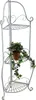 A silver metal corner shelf unit with a potted plant on one of the shelves. Podgląd zdjęcia produktu