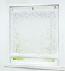 A white roller blind with a branch pattern is shown hanging in a window frame. Produktbild-Vorschau