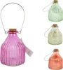 Four glass wasp traps in different colors are displayed against a white background. Podgląd zdjęcia produktu