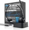 A black wireless headset with a charging station and cables, placed in front of its packaging. Produktbild-Vorschau