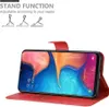 A red phone case with a phone inside, showing its stand function. Náhled obrázku produktu