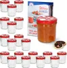 A set of glass jars with red and white polka dot lids, some filled with jam, next to a recipe booklet. Produktbild-Vorschau