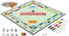 A Monopoly board game set with money, tokens, cards, and dice. Produktbild-Vorschau
