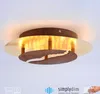 A decorative LED ceiling light with a rustic, metallic design. Produktbild-Vorschau