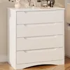 A white dresser with four drawers is shown in a room. Náhled obrázku produktu
