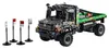 A LEGO Technic 4x4 Mercedes-Benz Zetros Offroad Truck with four signal flags. Produktbild-Vorschau