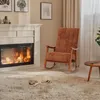 A cozy living room scene with a fireplace, rocking chair, and a sleeping puppy on a rug. Podgląd zdjęcia produktu