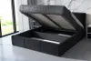 A black upholstered bed frame with the mattress base lifted to reveal storage space underneath. Produktbild-Vorschau