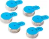 A group of six hearing aid batteries with blue protective tabs. Náhled obrázku produktu