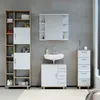 A bathroom vanity set with a sink, mirror, and storage cabinets against a tiled wall. Podgląd zdjęcia produktu