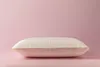 A pillow on a pink background. Produktbild-Vorschau