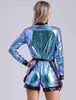 A woman is shown from the back wearing a metallic jumpsuit. Podgląd zdjęcia produktu