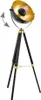 A black and gold tripod floor lamp. Podgląd zdjęcia produktu